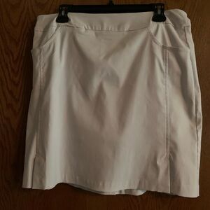 White skort, NWOT, Rayon, Nylon, & Spandex material